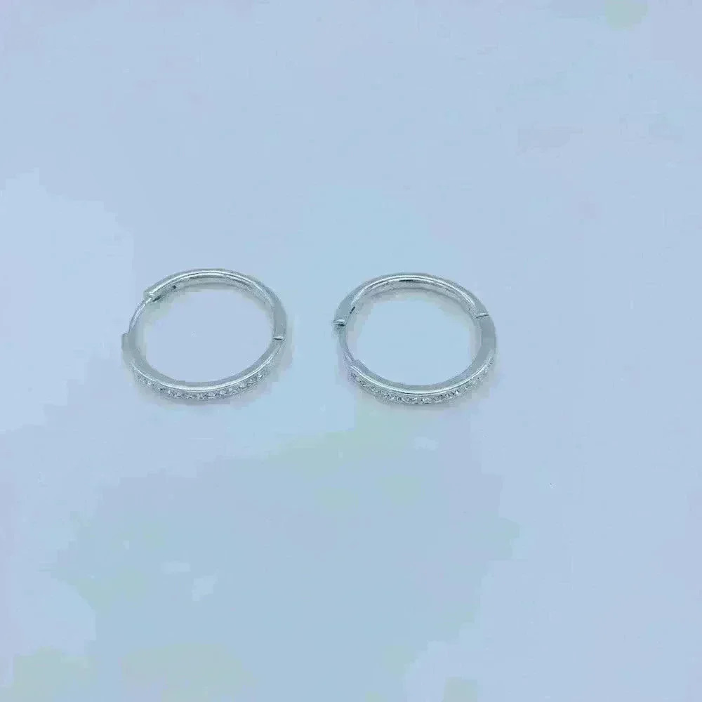 Silver and Diamond look earrings.